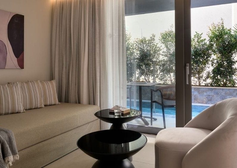 Deluxe Triple Room with Heated Swim Up Pool1